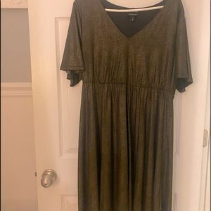 Black with golden threads throughout